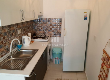 Cozy furnished two-bedroom apartment with access to the garden by the sea in the center of Alanya ID-6607 фото-5