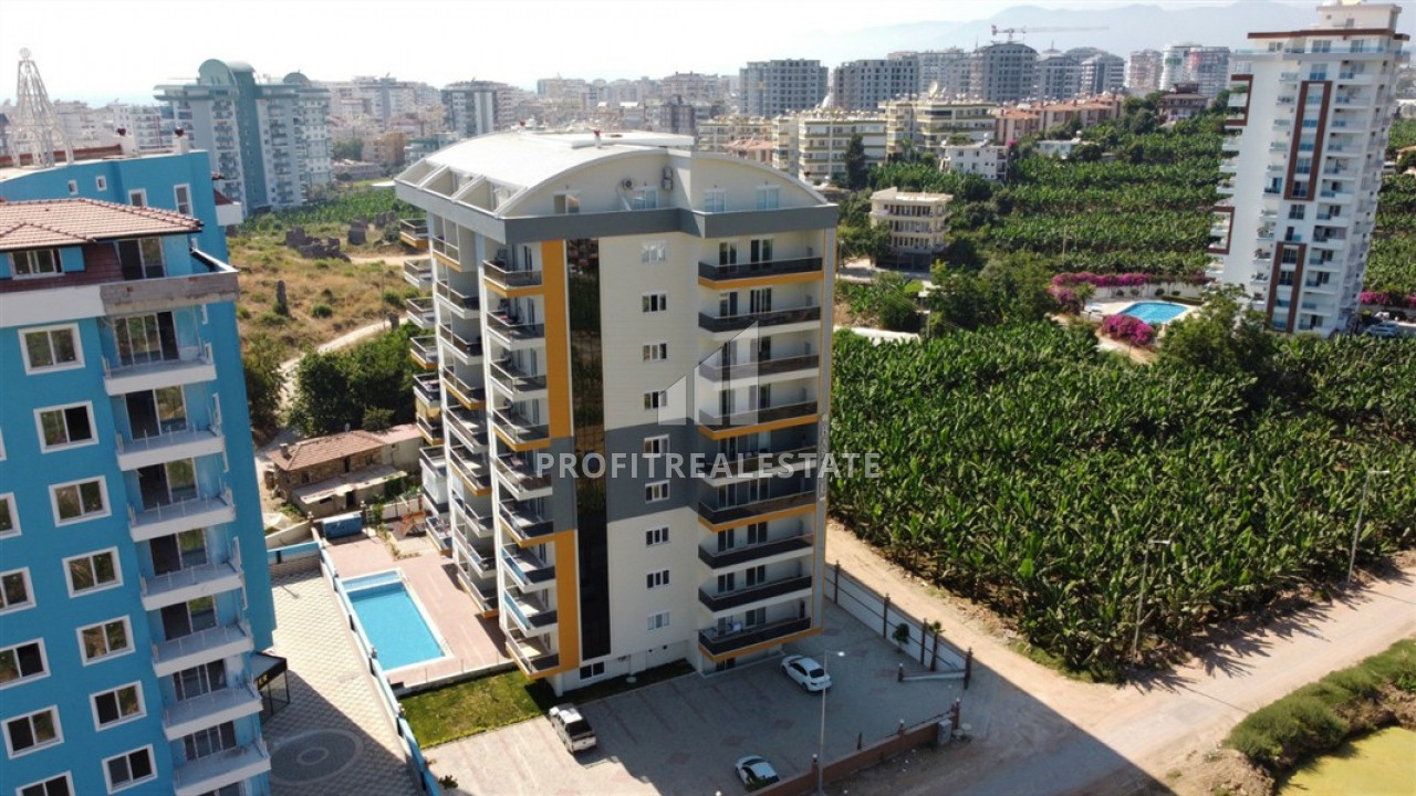 Ready to move in 1 + 1 view apartment in a new residence in Mahmutlar at an excellent price ID-6302 фото-1