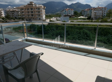 Furnished 1 + 1 apartment with mountain views in Oba area in a residence with good facilities ID-6619 фото-19}}