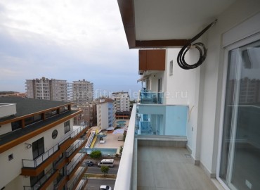 Просторные двухуровневые апартаменты с видом на море в центре Махмутлара ID-0450 фото-19