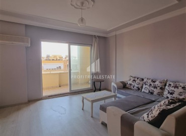 Resale property: two-bedroom apartment on the central street of Mahmutlar district in an urban-type building ID-6673 фото-5