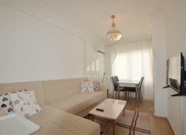 Alanya center: furnished 2 + 1 apartment in an urban-type house 300m from the Mediterranean Sea ID-6685 фото-1