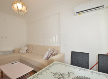 Alanya center: furnished 2 + 1 apartment in an urban-type house 300m from the Mediterranean Sea ID-6685 фото-5