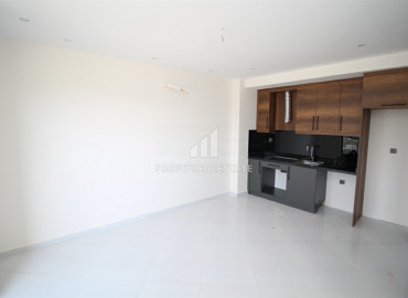 Новая двухкомнатная квартира в чистовой отделке, Махмутлар, Аланья, 50 м2 ID-6688 фото-4