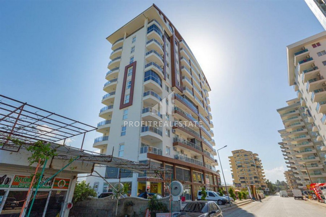 Furnished one-bedroom apartment on a high floor, 65m² in the central street of Mahmutlar ID-6729 фото-1