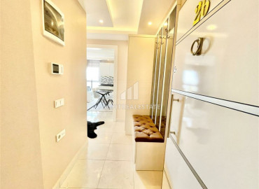 Обустроенная двухкомнатная квартира на высоком этаже, 65м² на центральной улице Махмутлара ID-6729 фото-5