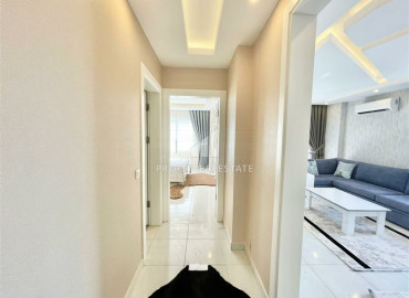 Обустроенная двухкомнатная квартира на высоком этаже, 65м² на центральной улице Махмутлара ID-6729 фото-11