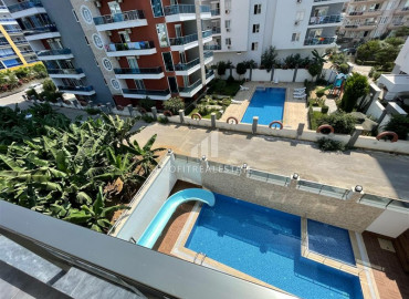 Apartment 1 + 1 in a new residence with good facilities in Mahmutlar 350m from the coast ID-6730 фото-11