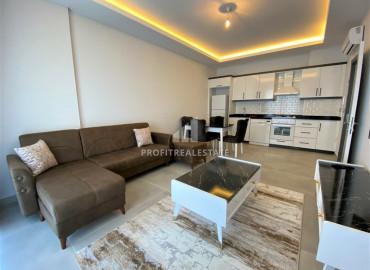 Furnished one bedroom apartment in a residence with good facilities, near the sea in Mahmutlar ID-6802 фото-1