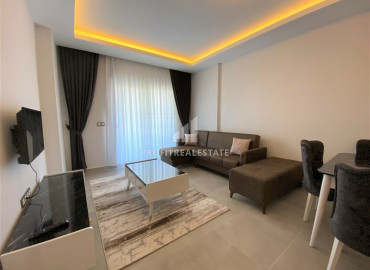 Furnished one bedroom apartment in a residence with good facilities, near the sea in Mahmutlar ID-6802 фото-2