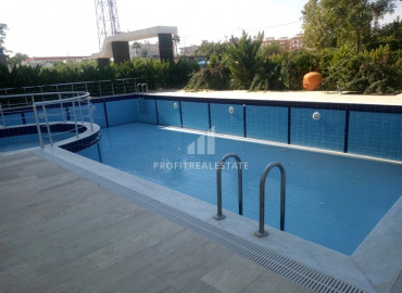 Favorable offer from the owner: a three bedroom apartment in Mersin, near the sea for only 70.5 thousand euros. ID-6839 фото-12}}