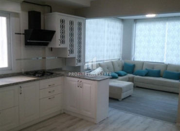 Favorable offer from the owner: a three bedroom apartment in Mersin, near the sea for only 70.5 thousand euros. ID-6839 фото-14}}