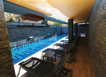 Two-bedroom apartment for rent in a new residence in the heart of Alanya ID-6890 фото-24