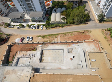 New apartment in a comfortable residence. 400 meters from the center of Mahmutlar, Alanya. 55-90 m2 ID-6893 фото-27