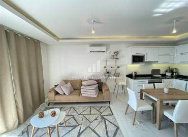 Furnished one-bedroom apartment in a premium residence 300m from the sea in Mahmutlar. ID-6920 фото-1