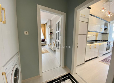 Renovated furnished two-bedroom apartment in an urban-type building in Mahmutlar ID-6922 фото-10