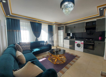 Cozy furnished 2 + 1 apartment with excellent location in Mahmutlar ID-6924 фото-1