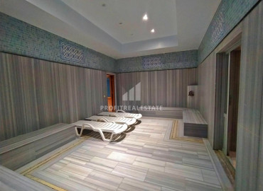 Spacious furnished two-bedroom apartment in a luxury residence in Mahmutlar ID-6935 фото-8