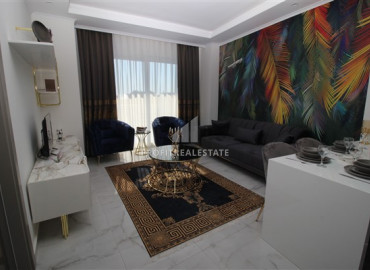 New 1 + 1 apartment in a residence with good facilities in Mahmutlar at an excellent price ID-6635 фото-3