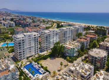 Luxurious one-bedroom apartment in an elite residence with hotel facilities, just 50 meters from the sea, Alanya, center ID-6974 фото-2