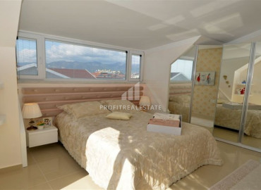 Ready-to-live-in duplex penthouse 2 + 1 with a separate kitchen on the first coastline in Kestel ID-7002 фото-13