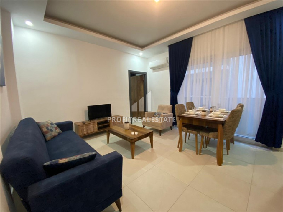 Ready to move in 1 + 1 apartment in a new residence in Mahmutlar at an excellent price ID-7030 фото-1