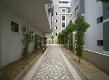 Ready to move in 1 + 1 apartment in a new residence in Mahmutlar at an excellent price ID-7030 фото-11