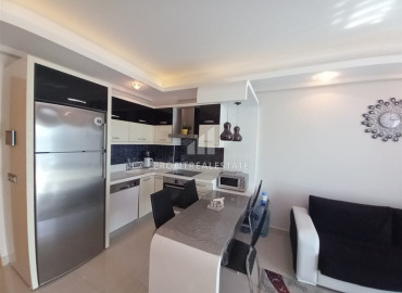 Furnished one-bedroom apartment in an elite residence at the foot of the Taurus Mountains in Mahmutlar ID-7037 фото-10