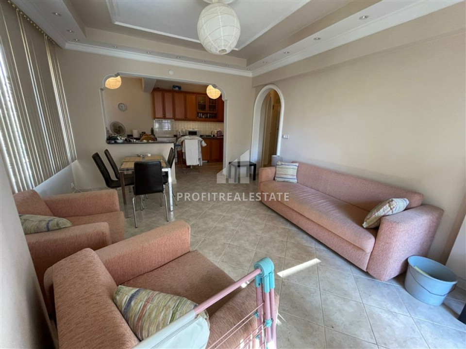 Budget resale property 50m from the sea: furnished two-bedroom apartment in Mahmutlar ID-7041 фото-2