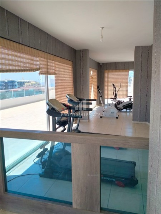 Apartment with two bedrooms, 95m² in a residence with a rooftop pool in Mahmutlar ID-7042 фото-2