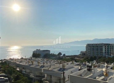 Spacious two-bedroom apartment with sea views in a residence with a swimming pool in Kargicak ID-7045 фото-1