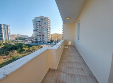 Inexpensive apartment with two bedrooms, 250m from the sea, in an urban-type house in Mahmutlar ID-7049 фото-9