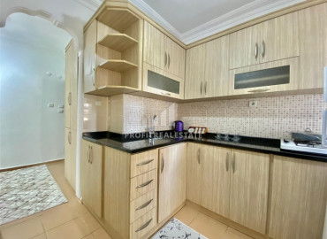 Inexpensive resale property: ready-to-live-in two bedroom apartment in Mahmutlar ID-7058 фото-4