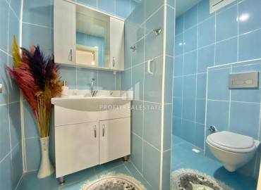 Inexpensive resale property: ready-to-live-in two bedroom apartment in Mahmutlar ID-7058 фото-7