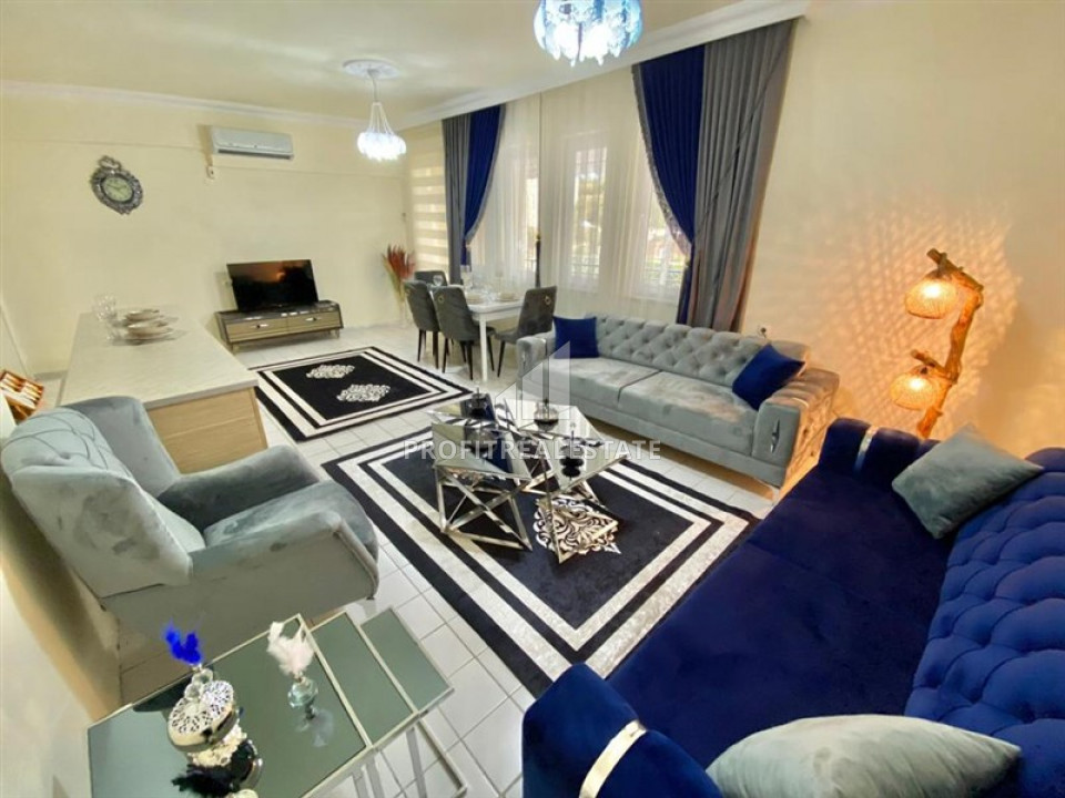 Inexpensive resale property: renovated 2 + 1 apartment in Mahmutlar ID-7070 фото-1