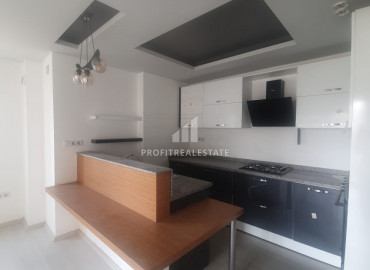 Favorable offer from the owner: a two bedroom apartment in Mersin, near the sea for only 41 thousand euros. ID-7088 фото-1