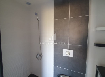 Favorable offer from the owner: a two bedroom apartment in Mersin, near the sea for only 41 thousand euros. ID-7088 фото-6