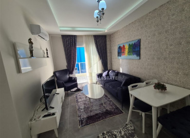 Готовая к проживанию квартира с одной спальней в новом комплексе в Махмутларе по отличной цене ID-7098 фото-1