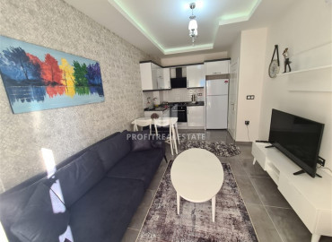 Готовая к проживанию квартира с одной спальней в новом комплексе в Махмутларе по отличной цене ID-7098 фото-4