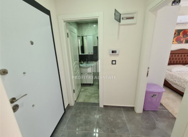 Готовая к проживанию квартира с одной спальней в новом комплексе в Махмутларе по отличной цене ID-7098 фото-11