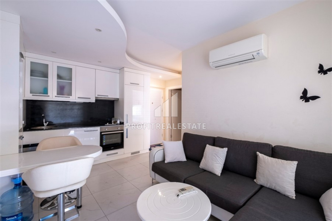 Меблированная двухкомнатная квартира в элитной резиденции у пляжа Клеопатры по отличной цене ID-7109 фото-1