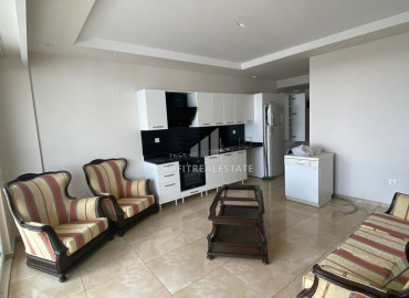 Furnished apartment 1 + 1, in Çeşmeli, Mersin, 120m from the coast at an attractive price ID-7113 фото-1
