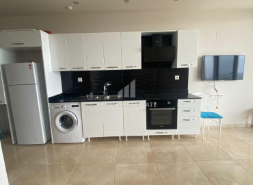 New one-bedroom apartment on a high floor, overlooking the sea in Çeşmeli, Mersin ID-7114 фото-3}}