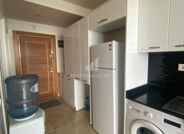 New one-bedroom apartment on a high floor, overlooking the sea in Çeşmeli, Mersin ID-7114 фото-7}}