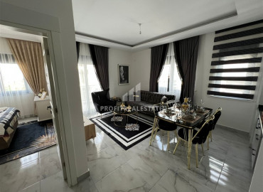 Двухкомнатные апартаменты, с профессиональным дизайном, в новой резиденции Махмутлара, Аланья, 55 м2 ID-7122 фото-5