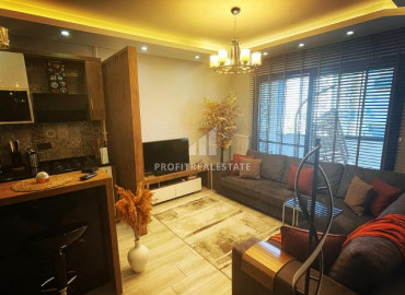 Design apartment 1 + 1 50 meters from the sea in the most popular district of Mersin - Tece. ID-7124 фото-9
