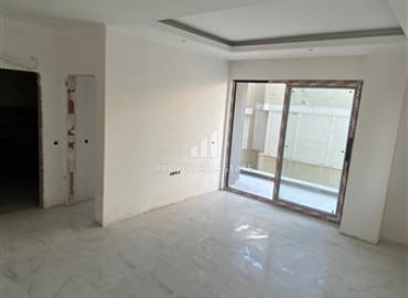 Новая двухкомнатная квартира в чистовой отделке, в 250 метрах от центра Махмутлара, Аланья, 55 м2 ID-7129 фото-3