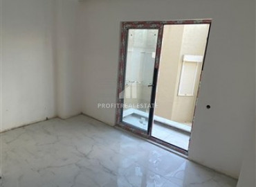 Новая двухкомнатная квартира в чистовой отделке, в 250 метрах от центра Махмутлара, Аланья, 55 м2 ID-7129 фото-4