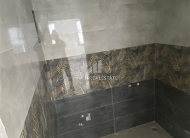 Новая двухкомнатная квартира в чистовой отделке, в 250 метрах от центра Махмутлара, Аланья, 55 м2 ID-7129 фото-5