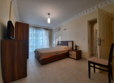 Furnished apartment 2 + 1 with a good location 400m from the sea in Mahmutlar ID-7134 фото-11